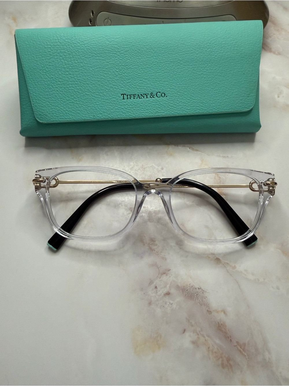 Tiffany & Co. Clear Frame Glasses with Black Temples and Gold Accents